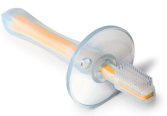 La foto mostra uno spazzolino speciale per bambini con un limitatore
