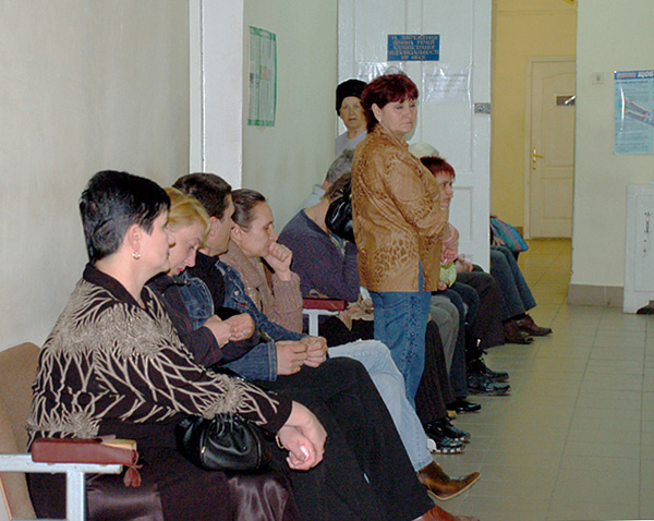 The line in the corridor of the dental clinic.